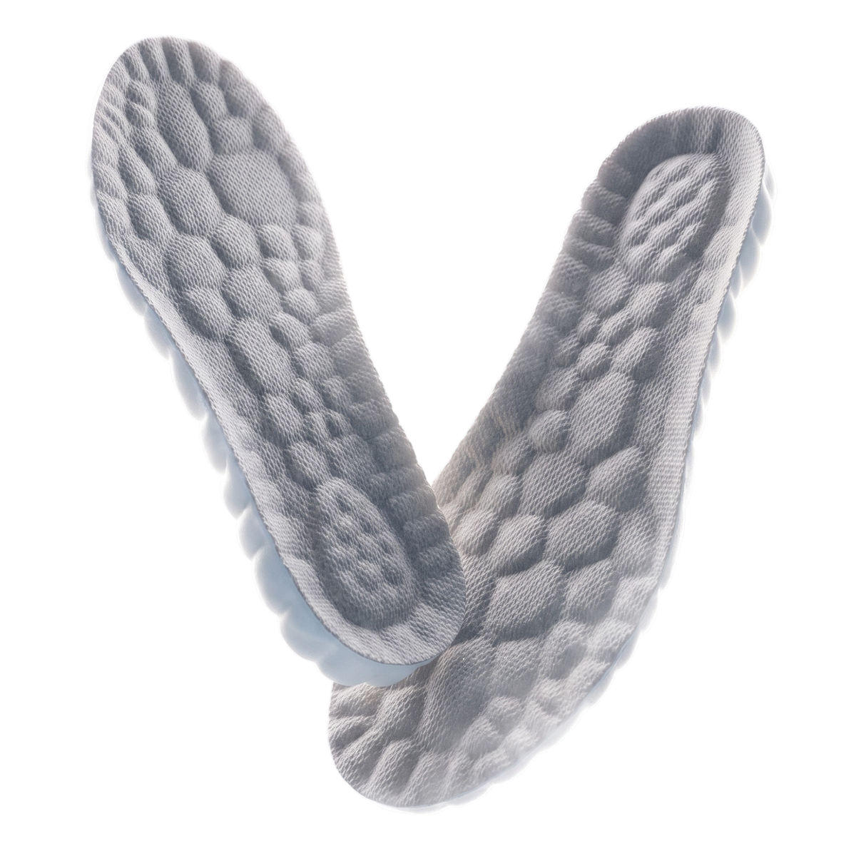 A pair of Cloud Comfort insoles floating in a bright blue sky